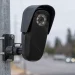 Image of a flock camera attached to a street pole.